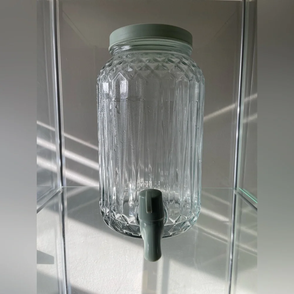 IKEA Clear Glass Beverage Dispenser with Green Lid and Spout